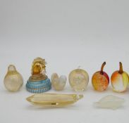A collection of glass paperweights including Isle of Wight, Kosta Boda and a Haveland opaque glass