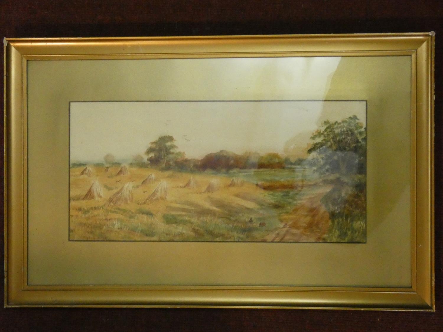 A framed glazed 19th century watercolour of a hay field at harvest. H.49 W.76cm - Image 2 of 3