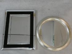 An Art Deco style wall mirror and a circular silvered frame mirror. H.91 W.70cm