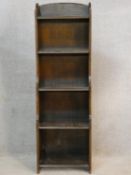 A narrow vintage oak waterfall open bookcase. H.115 W.37 D.23cm