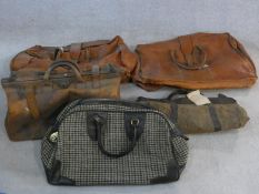 A miscellaneous collection of five various vintage holdalls, to include a leather gladstone bag,