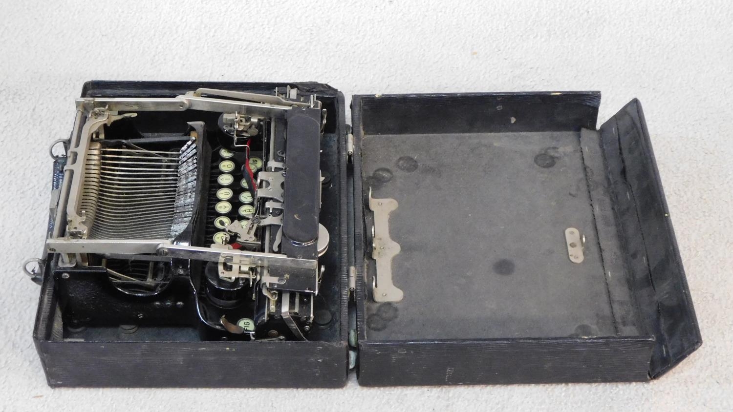 Corona black enamel metal typewriter inscribed L C Smith & Corona Typewriters Inc, in carrying case. - Image 5 of 6