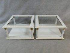 A pair of contemporary white lacquered two tier low tables with inset plate glass tops. H.43 L.80