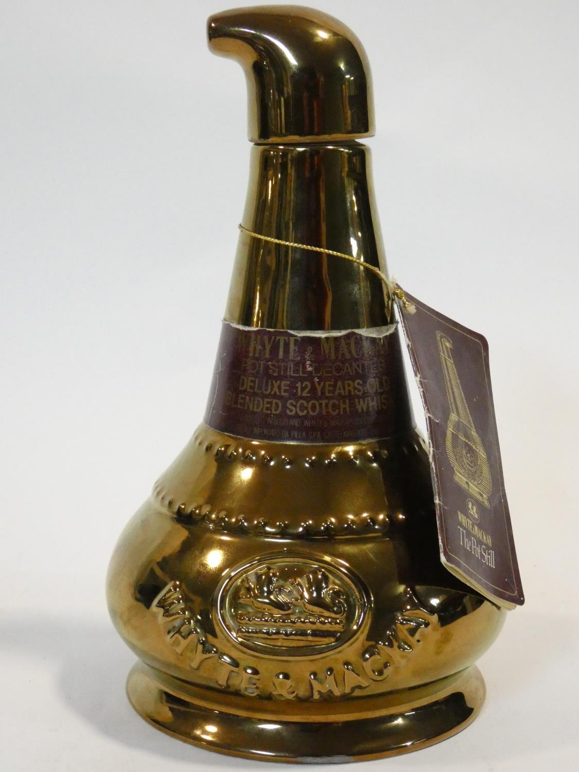 A rare Wade, discontinued pot still shaped decanter from Whyte & Mackay. Aged 12 years old, it is - Image 2 of 18