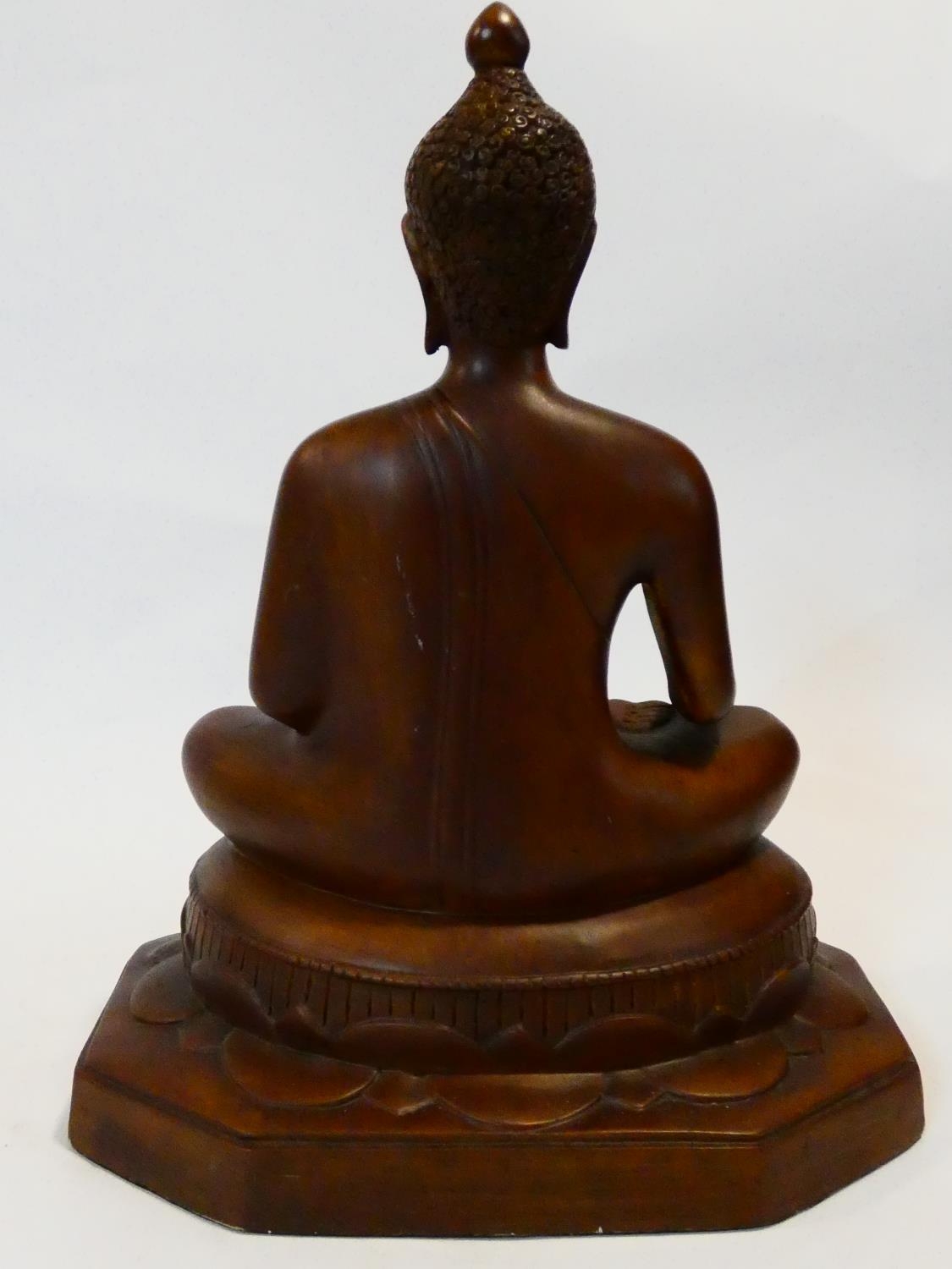 A gilded resin seated Buddha figure. H.41 W.32 L.20cm - Image 5 of 7