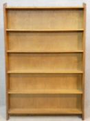 A vintage light oak graduating open bookcase. H.126 W.84 D.26cm