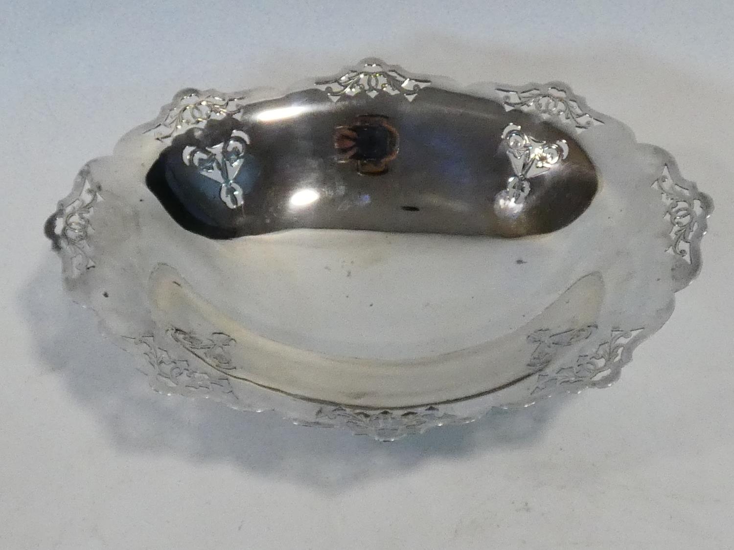 A silver plated twin handled galleried tray along with a silver plated comport with pierced - Image 3 of 7