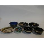 A collection of bowls. Including a Chinese cloisonne enamel bowl, four carved horn and white metal