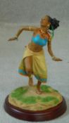 A boxed Thomas Blackshear Ebony Visions ?The Dancer? limited Edition hand painted figure mounted