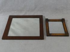 An early 19th century mahogany pier mirror with pilasters to each side and an Edwardian mahogany and