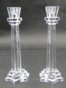 A pair of Swedish crystal star design candle sticks H.24cm