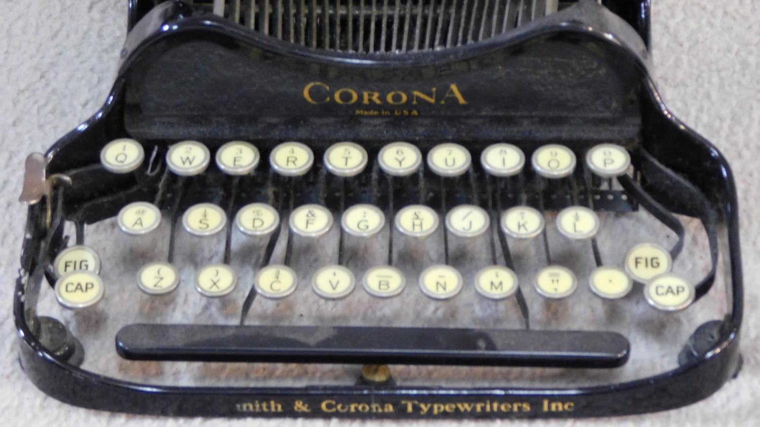 Corona black enamel metal typewriter inscribed L C Smith & Corona Typewriters Inc, in carrying case. - Image 4 of 6