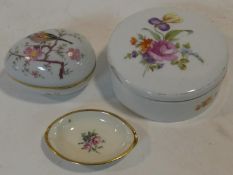 A hand painted Herend lidded pot, a porcelain and gilt metal Limoges egg and a Furstenburg dish.