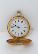 A 19th century ladies pocket watch in 18ct yellow gold, the half hunter case all over engraved