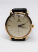 A vintage gentleman's Omega 9ct gold cased wristwatch, with subsidiary seconds dial, possibly 1960'