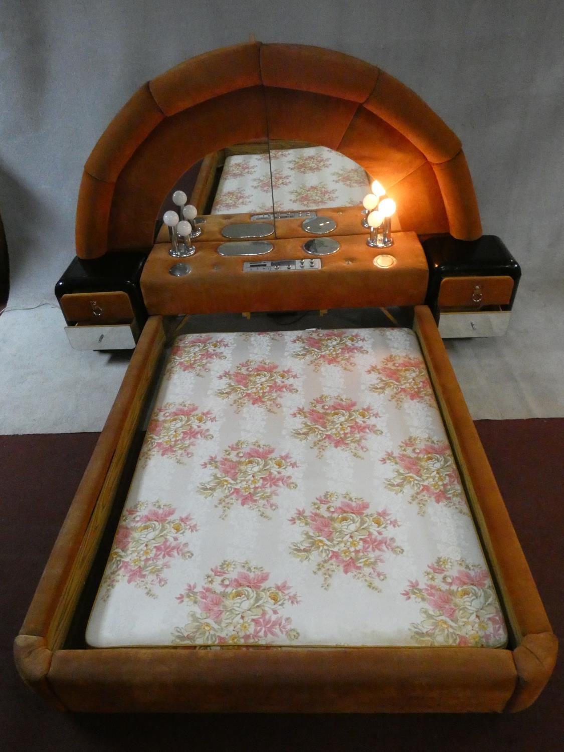 A highly unusual 1970's vintage bedstead with arched velour upholstered and mirrored head board with - Image 2 of 14