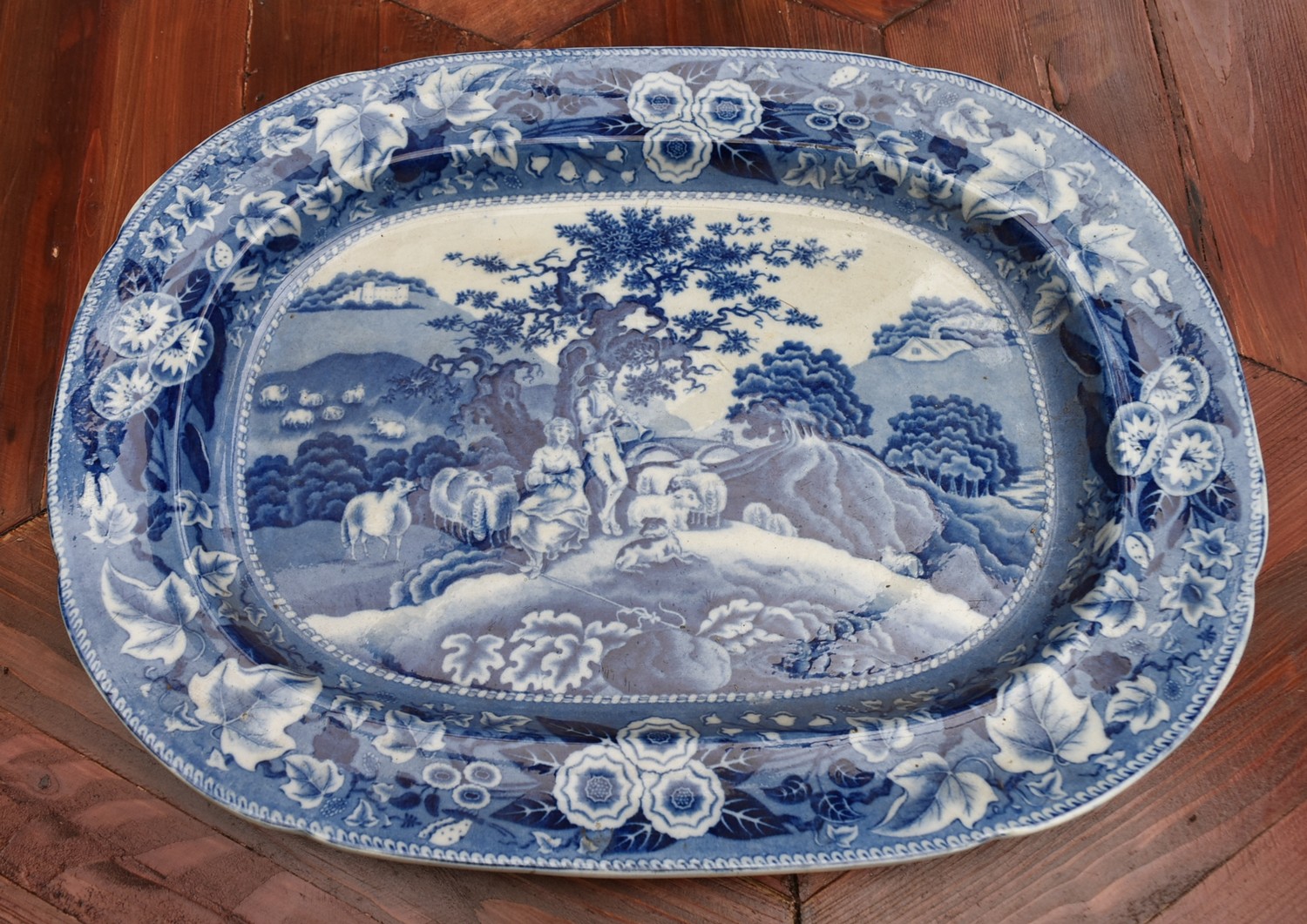 Possibly 18th century, a large blue and white transferware meat platter. L.45cm