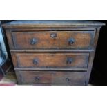 An early 18th century country oak chest of three long drawers. H.79xW.110xD.60cm (missing it's