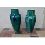 A pair of drip glazed floor standing Sharab wine vessels. H.83xDia.40cm