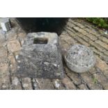 A small carved stone garden pyramid and spherical finial. H. 50cm
