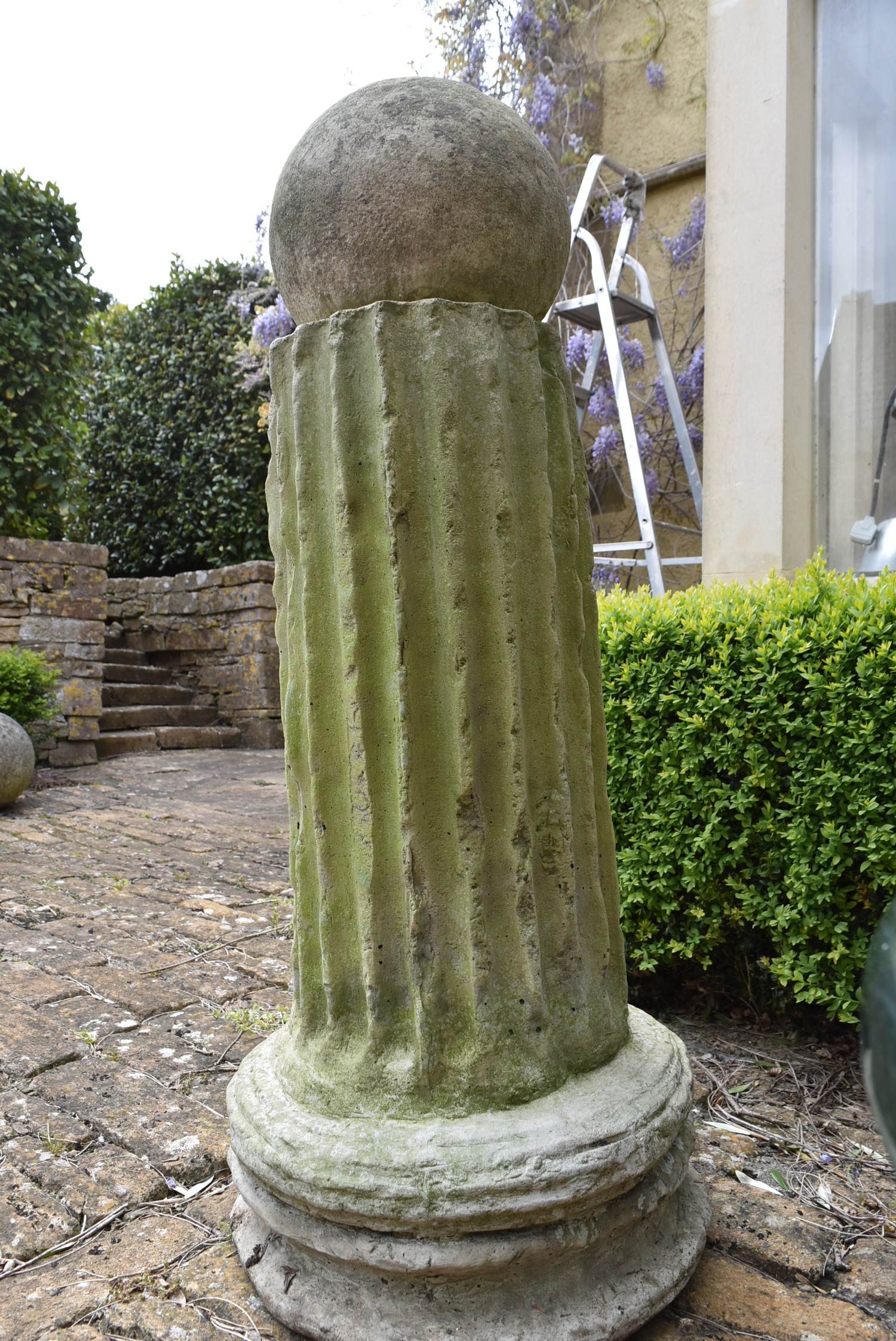 A moulded concrete classical column style plinth with weathered spherical finial. H.128cm - Image 3 of 3