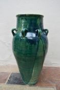 A floor standing drip glazed Sharab wine vessel. H.80xW.40cm