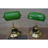 A pair of brass banker's desk lamps with adjustable green glass shades. H.40cm (2)
