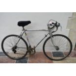 A 1970's vintage Peugeot ten gear 26" wheel racing bike. (Has new tyres, missing one gear lever