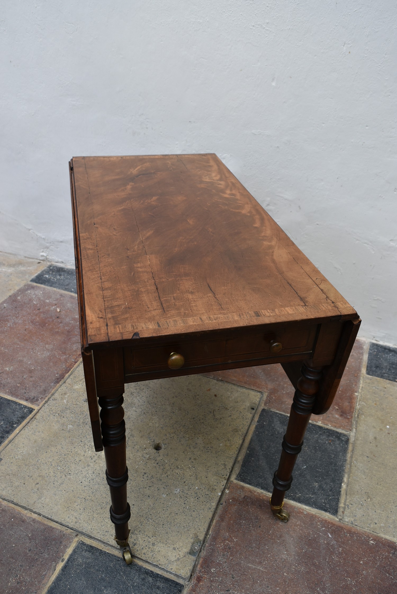 A Regency figured mahogany and rosewood crossbanded Pembroke table on ring turned tapering - Image 2 of 8