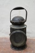 A vintage railwayman's metal cased signal lantern. H.32cm