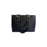 A Chanel Grand Shopping Tote Black Caviar leather with gold hardware. W.33cm x H.25.5cm x D.13.5cm
