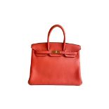 A Rouge Pivoine Hermes Birkin 35cm in clemence leather with gold hardware. Includes Box, Dustbag,