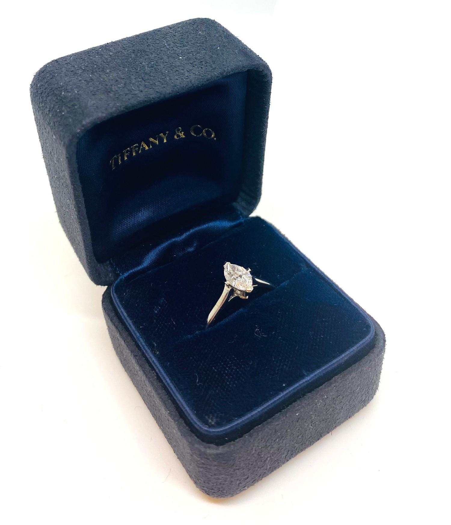 A Contemporary 0.70ct Tiffany Marquis diamond solitaire ring mounted in platinum. The central