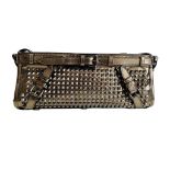 A Burberry metallic Clutch in Pewter Patent leather with silver hardware. Includes Dustbag,