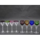 Eight antique Bohemian cut to clear sherry/cordial glasses. A set of four with vine design and