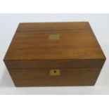 A 19th century walnut and brass inlaid writing slope with fitted interior. H.15 L.30 W.22cm