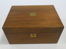 A 19th century walnut and brass inlaid writing slope with fitted interior. H.15 L.30 W.22cm
