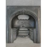 A Victorian cast iron fire insert. H.91 W.81cm
