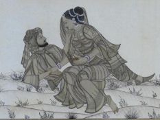 A framed and glazed antique Indo-Persian silk painting of a young couple in love, with gilded