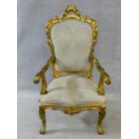 A Louis XVI style gilt framed throne armchair in pale damask upholstery. H.129cm