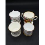 Four Victorian hand painted and gilded floral design christening mugs, some with gilded