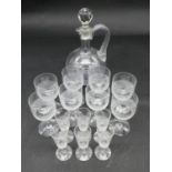 A collection of antique hand cut crystal glassware. Including six sherry glasses, eight wine glasses