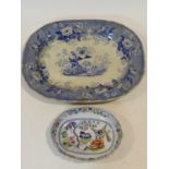 An antique ceramic blue and white transferware design meat platter with 'Botanical Beauties'