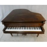 A 'Lestel' of London mahogany cased boudoir baby grand piano, metal framed, raised on square