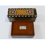 A set of 19th century bone alphabet tiles in a mahogany box with sliding cover inscribed Spelling