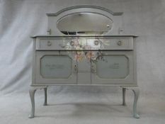 A mid century mirror backed sideboard with all over later painted decoration. H.150 W.122 D.47cm