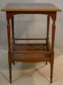 An Edwardian burr walnut and satinwood crossbanded occasional table on shaped tapering supports