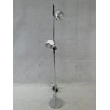 A vintage style chrome standard lamp fitted with two adjustable spotlights. H.147cm