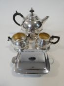 A Vintage 1950's Masters Patent silver plated on copper teapot and matching jug and sugar bowl,