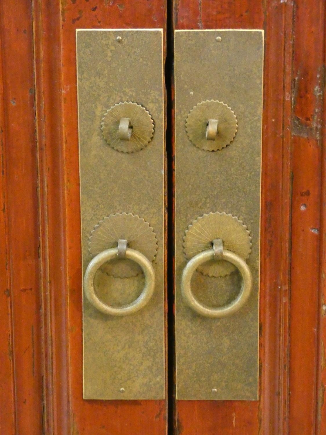 A Chinese hardwood and brass bound side cabinet with frieze drawers above a pair of panel doors on - Image 5 of 6